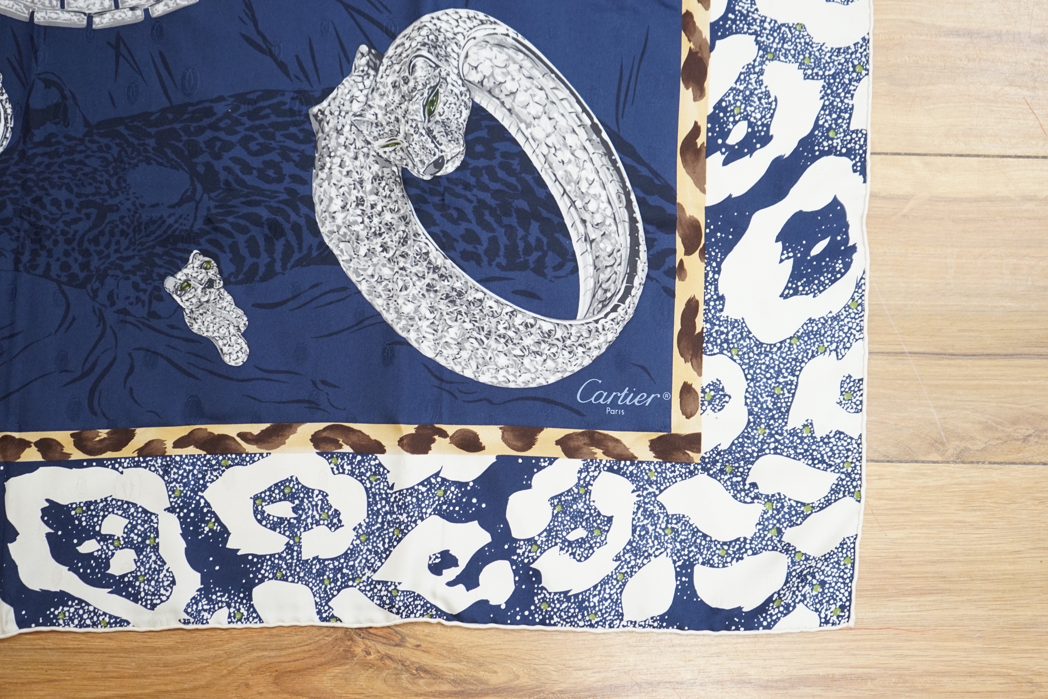 A Cartier silk scarf with Leopard motif